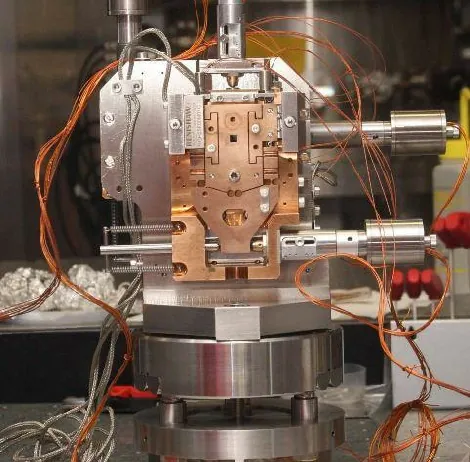 Secondary source aperture mechanism on the assembly bench